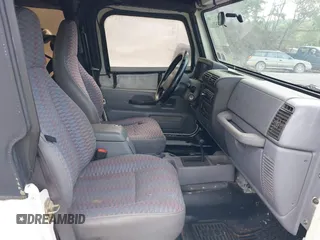 1998 Jeep Wrangler SE with VIN 1J4FY29P0WP792787, listed as a IAAI auction lot 42631661 with 190,180 mi miles and . Bid and sale history available at DreamBid. Image 5.