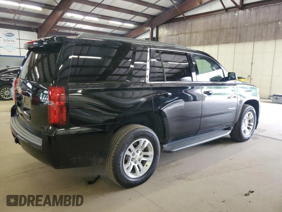 2015 Chevrolet Tahoe LS with VIN 1GNSCAKC9FR301715, listed as a Copart auction lot 64249005 with 107,240 mi miles and Clean title. Bid and sale history available at DreamBid. Image 3.