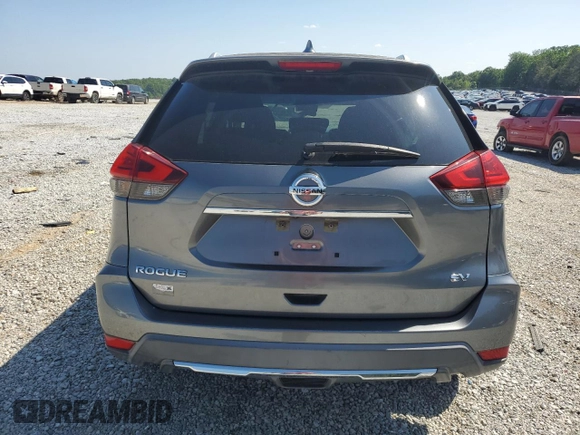 2017 Nissan Rogue SV z VIN KNMAT2MT2HP560262, wystawiony jako Copart lot #54861885 z przebiegiem 109 604 mil mil oraz Szkoda całkowita • Salvage title. Historia ofert i sprzedaży dostępna na DreamBid. Obrazek 6.