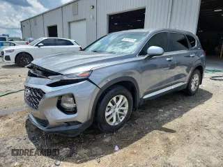 2019 Hyundai Santa Fe SE with VIN 5NMS23AD7KH134965, listed as a Copart auction lot 63212975 with 50,196 mi miles and Salvage title. Bid and sale history available at DreamBid. Image 1.