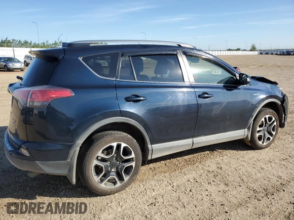 2018 Toyota RAV4 Hybrid SE with VIN JTMJJREV2JD230126, listed as a Copart auction lot 62574005 with 196,846 mi miles and Salvage title. Bid and sale history available at DreamBid. Image 3.