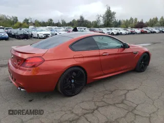 2014 BMW M6 z VIN WBSLX9C52ED160071, wystawiony jako Copart lot #77452554 z przebiegiem 64 814 mil mil oraz Szkoda całkowita • Salvage title. Historia ofert i sprzedaży dostępna na DreamBid. Obrazek 3.