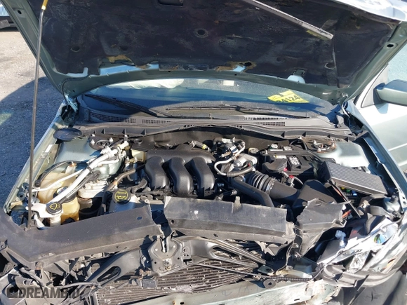 2006 Ford Fusion SE with VIN 3FAHP07116R103391, listed as a IAAI auction lot 41700991 with 115,025 mi miles. Bid and sale history available at carsss.com. Image 10.