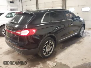 2016 Lincoln MKX Reserve with VIN 2LMTJ8LR8GBL77039, listed as a IAAI auction lot 41894660 with 110,599 mi miles. Bid and sale history available at carsss.com. Image 4.