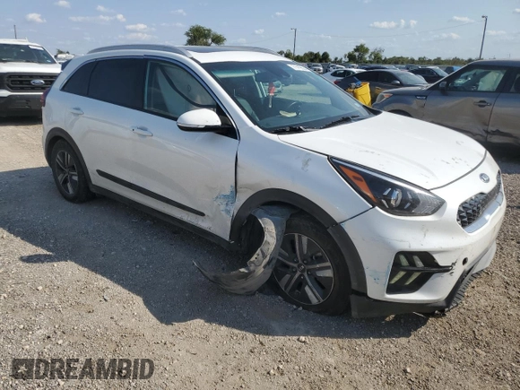 2020 Kia Niro EX Premium with VIN KNDCE3LC8L5421039, listed as a Copart auction lot 71419004 with 104,070 mi miles and Salvage Title. Bid and sale history available at carsss.com. Image 4.