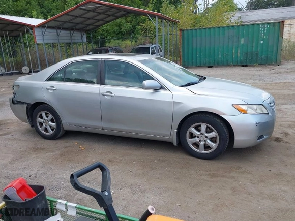 2007 Toyota Camry CE with VIN 4T1BE46K77U140703, listed as a IAAI auction lot 40193348 with 183,987 mi miles. Bid and sale history available at carsss.com. Image 13.