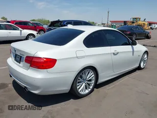 2011 BMW 3 Series 335i with VIN WBAKG7C53BE598107, listed as a IAAI auction lot 42498533 with 129,784 mi miles and . Bid and sale history available at DreamBid. Image 4.