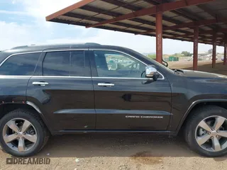 2014 Jeep Grand Cherokee Overland with VIN 1C4RJFCG4EC273786, listed as a IAAI auction lot 41901304 with 73,055 mi miles. Bid and sale history available at carsss.com. Image 13.