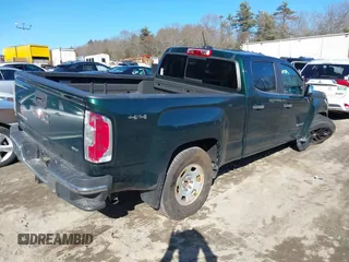 2015 GMC Canyon 4WD SLT with VIN 1GTG6CE35F1273343, listed as a IAAI auction lot 41683758 with 77,911 mi miles. Bid and sale history available at carsss.com. Image 4.