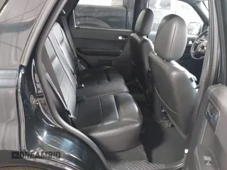 2009 Ford Escape Limited z VIN 1FMCU04G29KA59623, wystawiony jako IAAI lot #42428300 z przebiegiem 115 915 mil mil oraz . Historia ofert i sprzedaży dostępna na DreamBid. Obrazek 8.