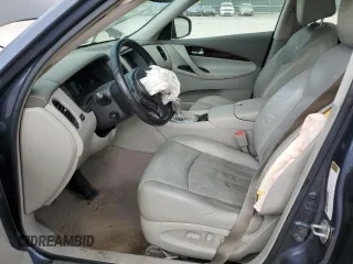 2010 Infiniti EX Journey with VIN JN1AJ0HR4AM751703, listed as a Copart auction lot 82105324 with 167,381 mi miles and Salvage Title. Bid and sale history available at DreamBid. Image 7.