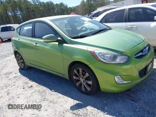2013 Hyundai Accent SE with VIN KMHCU5AE4DU108768, listed as a IAAI auction lot 41851732 with 123,601 mi miles. Bid and sale history available at carsss.com. Image 1.