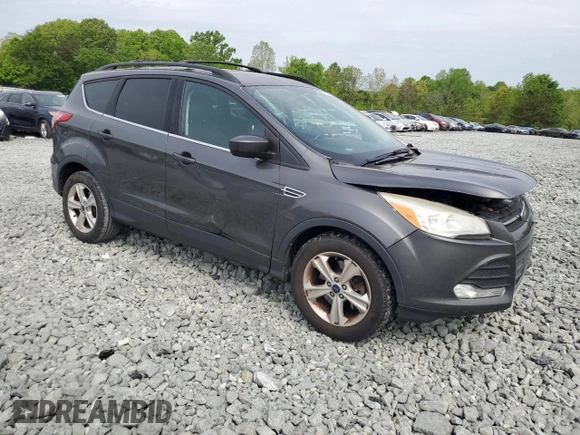 2015 Ford Escape SE with VIN 1FMCU9G94FUA91796, listed as a Copart auction lot 53605895 with 165,353 mi miles and Salvage Title. Bid and sale history available at DreamBid. Image 4.