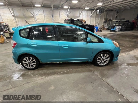 2013 Honda Fit Sport with VIN JHMGE8H58DC044846, listed as a IAAI auction lot 42201605 with 198,546 mi miles. Bid and sale history available at carsss.com. Image 12.