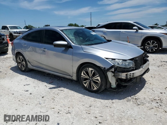 2017 Honda Civic EX-L with VIN 19XFC1F7XHE030606, listed as a Copart auction lot 56536095 with 101,465 mi miles and Salvage title. Bid and sale history available at DreamBid. Image 4.