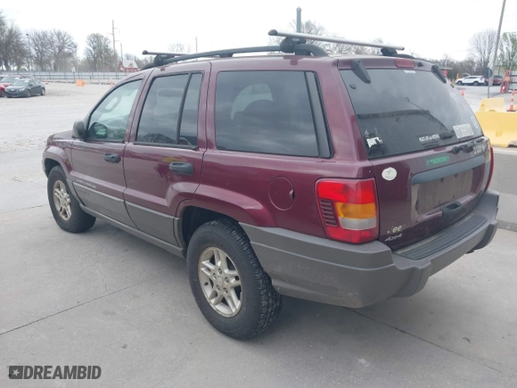 2003 Jeep Grand Cherokee Laredo with VIN 1J4GW48S83C563627, listed as a IAAI auction lot 41910225 with 150,264 mi miles. Bid and sale history available at carsss.com. Image 3.