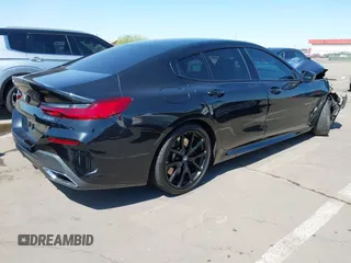 2022 BMW 8 Series 840i with VIN WBAGV2C06NCH71589, listed as a IAAI auction lot 41852263 with Not Provided miles and . Bid and sale history available at carsss.com. Image 4.