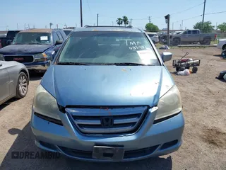 2005 Honda Odyssey EX-L with VIN 5FNRL387X5B083902, listed as a IAAI auction lot 42005085 with 249,861 mi miles. Bid and sale history available at carsss.com. Image 6.