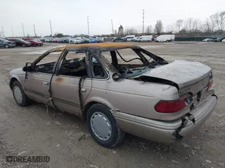 1994 Ford Taurus GL with VIN 1FALP52U6RA258445, listed as a IAAI auction lot 41512672 with 1 mi miles. Bid and sale history available at carsss.com. Image 3.