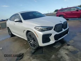 2023 BMW X6 xDrive40i z VIN 5UXCY6C08P9N43749, wystawiony jako Copart lot #54092795 z przebiegiem 39 495 mil mil oraz Szkody całkowita. Historia ofert i sprzedaży dostępna na DreamBid. Obrazek 15.