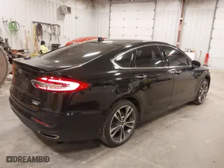 2019 Ford Fusion Titanium with VIN 3FA6P0K93KR269569, listed as a IAAI auction lot 41811177 with 110,231 mi miles. Bid and sale history available at carsss.com. Image 4.