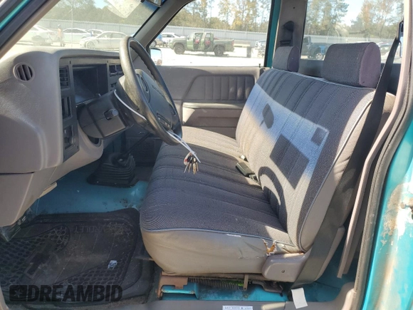1996 Dodge Dakota with VIN 1B7FL26X9TW706385, listed as a Copart auction lot 77003174 with 146,228 mi miles and Salvage Title. Bid and sale history available at carsss.com. Image 7.