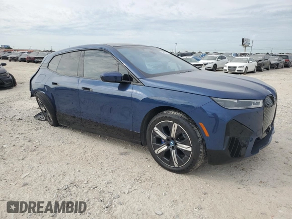 2023 BMW iX M60 with VIN WB533CF01PCM29925, listed as a Copart auction lot 54160244 with 8,226 mi miles and Salvage Title. Bid and sale history available at carsss.com. Image 4.