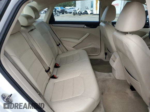 2014 Volkswagen Passat Wolfsburg Edition z VIN 1VWAT7A3XEC021986, wystawiony jako Copart lot #48819995 z przebiegiem 125 699 mil mil oraz Szkoda całkowita • Salvage title. Historia ofert i sprzedaży dostępna na DreamBid. Obrazek 11.