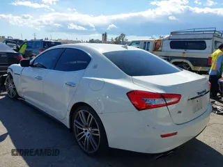 2015 Maserati Ghibli z VIN ZAM57XSA8F1161212, wystawiony jako IAAI lot #41746084 z przebiegiem 57 169 mil mil oraz . Historia ofert i sprzedaży dostępna na DreamBid. Obrazek 3.