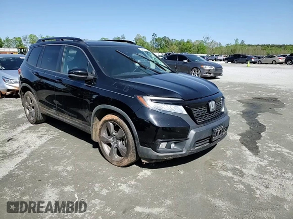 2019 Honda Passport Touring with VIN 5FNYF7H90KB000193, listed as a Copart auction lot 52402915 with 120,968 mi miles and Salvage title. Bid and sale history available at DreamBid. Image 12.