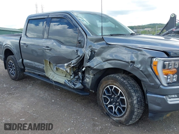 2021 Ford F-150 XL with VIN 1FTFW1E56MKE74015, listed as a IAAI auction lot 42172934 with 27,186 mi miles and . Bid and sale history available at DreamBid. Image 6.