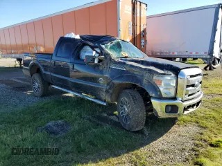 2014 Ford F-350 XLT with VIN 1FT8W3BT2EEA54050, listed as a Copart auction lot 50062505 with 142,252 mi miles and Salvage title. Bid and sale history available at DreamBid. Image 4.