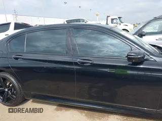 2017 BMW 7 Series 750i with VIN WBA7F0C55HGM21460, listed as a IAAI auction lot 41934198 with 58,206 mi miles and . Bid and sale history available at DreamBid. Image 13.