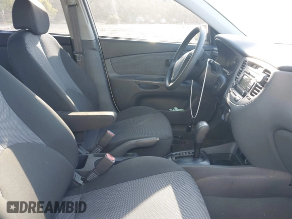 2009 Kia Rio LX with VIN KNADE243096440150, listed as a IAAI auction lot 42152589 with 114,484 mi miles. Bid and sale history available at carsss.com. Image 5.