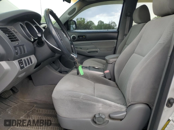 2005 Toyota Tacoma z VIN 5TEMU52N35Z126145, wystawiony jako Copart lot #55391105 z przebiegiem 150 046 mil mil oraz Szkoda całkowita • Salvage title. Historia ofert i sprzedaży dostępna na DreamBid. Obrazek 7.
