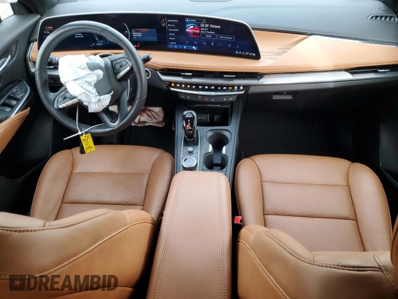 2024 Cadillac XT4 FWD Sport with VIN 1GYFZER46RF100076, listed as a Copart auction lot 45741285 with 11,616 mi miles and Salvage title. Bid and sale history available at DreamBid. Image 8.