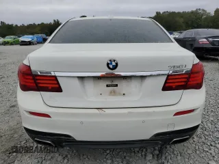 2015 BMW 7 Series 750i z VIN WBAYA8C5XFD825662, wystawiony jako Copart lot #78850474 z przebiegiem 153 080 mil mil oraz Czysty tytuł • Clean title. Historia ofert i sprzedaży dostępna na DreamBid. Obrazek 6.