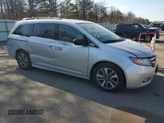 2014 Honda Odyssey Touring with VIN 5FNRL5H94EB094357, listed as a Copart auction lot 53930635 with 210,448 mi miles and Salvage Title. Bid and sale history available at carsss.com. Image 4.