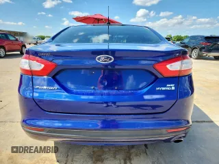 2013 Ford Fusion SE Hybrid with VIN 3FA6P0LU0DR273438, listed as a Copart auction lot 60033665 with 74,474 mi miles and Salvage title. Bid and sale history available at DreamBid. Image 6.