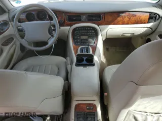 1999 Jaguar XJ with VIN SAJHD1043XC869413, listed as a Copart auction lot 76940624 with 0 mi miles and Salvage Title. Bid and sale history available at carsss.com. Image 8.