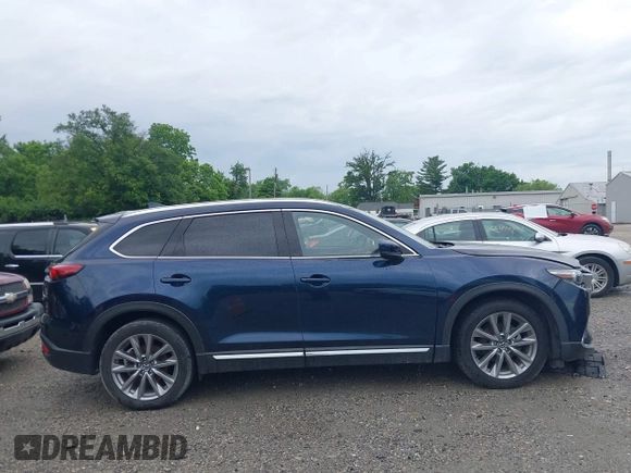 2021 Mazda CX-9 Carbon Edition z VIN JM3TCBDY7M0536005, wystawiony jako IAAI lot #42424129 z przebiegiem 48 005 mil mil oraz . Historia ofert i sprzedaży dostępna na DreamBid. Obrazek 14.