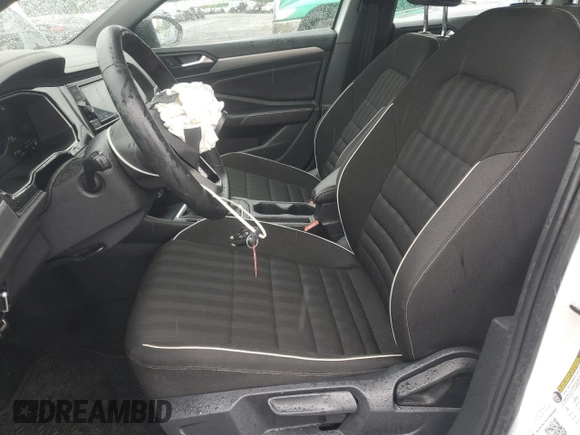 2024 Volkswagen Jetta Sport with VIN 3VWBM7BU9RM027694, listed as a Copart auction lot 56828095 with 19,627 mi miles and Salvage title. Bid and sale history available at DreamBid. Image 7.