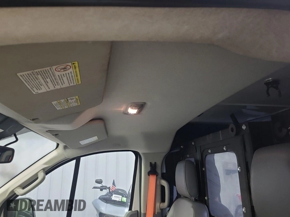 2016 Ford Transit Cargo z VIN 1FTYE1YM9GKB19505, wystawiony jako IAAI lot #42774251 z przebiegiem 252 184 mil mil oraz . Historia ofert i sprzedaży dostępna na DreamBid. Obrazek 20.
