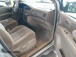 2001 Toyota Sienna CE with VIN 4T3ZF19C31U393059, listed as a IAAI auction lot 41809583 with 237,250 mi miles. Bid and sale history available at carsss.com. Image 5.