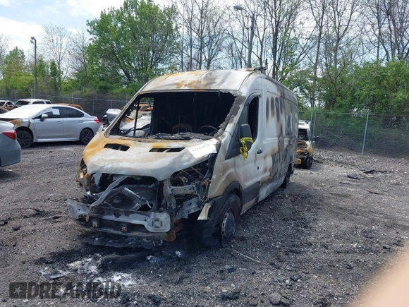 2015 Ford Transit Cargo with VIN 1FTNR2CG5FKA99184, listed as a IAAI auction lot 42143175 with Not provided miles and . Bid and sale history available at DreamBid. Image 2.