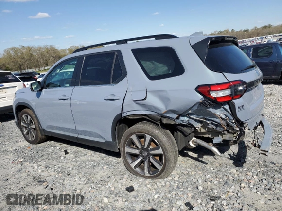 2024 Honda Pilot Touring with VIN 5FNYG2H79RB004803, listed as a Copart auction lot 49702415 with 27,406 mi miles and Salvage title. Bid and sale history available at DreamBid. Image 2.