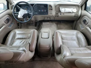 1999 GMC Yukon with VIN 1GKEK13R9XJ787877, listed as a Copart auction lot 72185044 with 191,710 mi miles and Salvage Title. Bid and sale history available at carsss.com. Image 8.