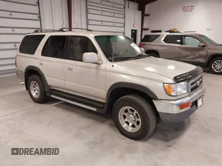 1998 Toyota 4Runner SR5 z VIN JT3GN86R0W0079865, wystawiony jako IAAI lot #41404310 z przebiegiem 174 324 mil mil oraz . Historia ofert i sprzedaży dostępna na DreamBid. Obrazek 1.