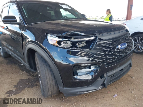 2022 Ford Explorer ST-Line z VIN 1FMSK7KH5NGA21032, wystawiony jako IAAI lot #42212415 z przebiegiem 49 034 mil mil oraz . Historia ofert i sprzedaży dostępna na DreamBid. Obrazek 6.