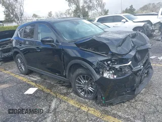 2021 Mazda CX-5 Sport with VIN JM3KFABM1M0356760, listed as a IAAI auction lot 39131600 with 1 mi miles. Bid and sale history available at carsss.com. Image 1.
